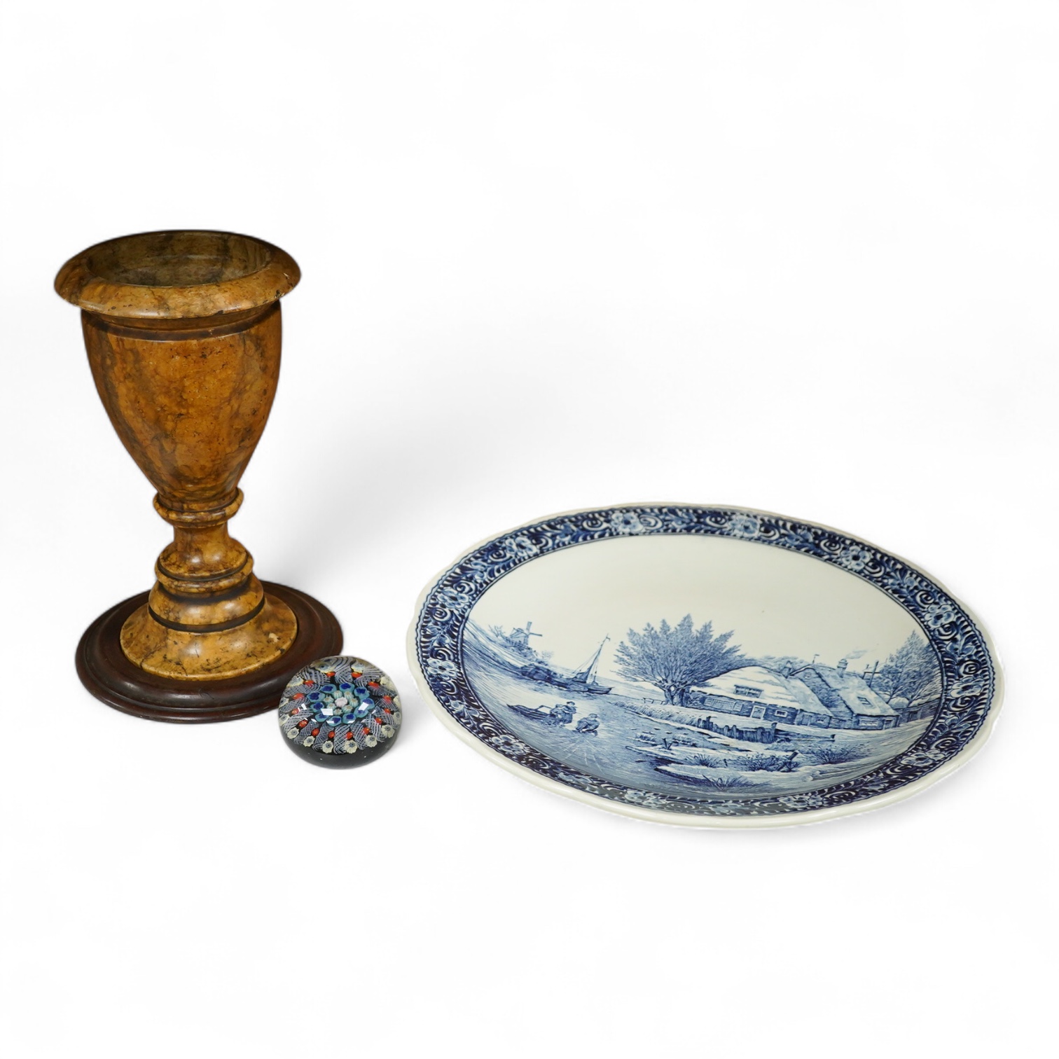 A 19th century Sienna marble urn on stand together with an English glass paperweight and Boch Delfts charger, 39cm